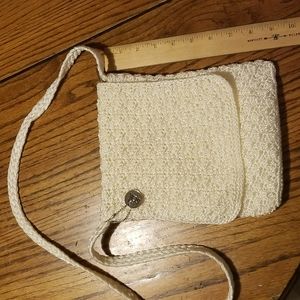 The SAK cream colored cross body purse.  7x9 with foldover flap.